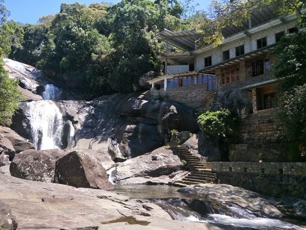 Resort building beside waterfall