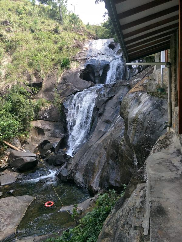 Waterfall beside resort veranda