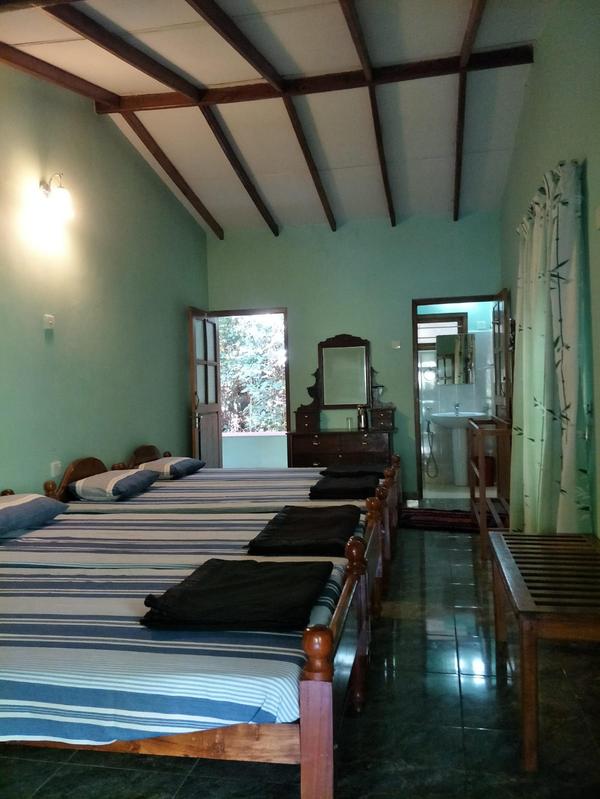 Spacious bedroom with wooden beams