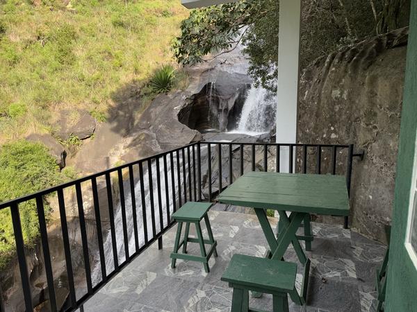 Balcony seating overlooking waterfall